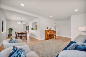 A dining room featuring a table surrounded by chairs, creating an inviting space for meals and gatherings.