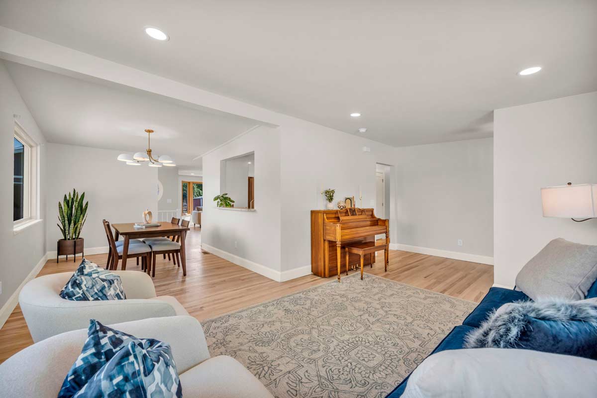 A dining room featuring a table surrounded by chairs, creating an inviting space for meals and gatherings.